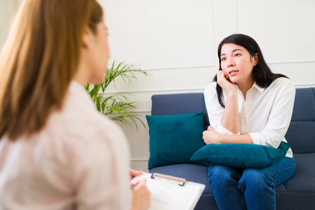 A person talks to a therapist about EMDR for anxiety.